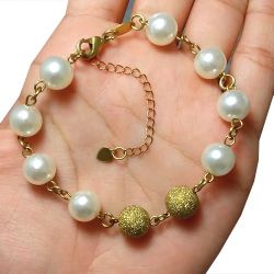 Pulseira No Bruto Pronto Para Banho Com Perolas e Bolas De 10mm Tamanho Aproximado: 20,0cm Extensor: 6,0cm Peso: 7,8 gramas REF: BRU603