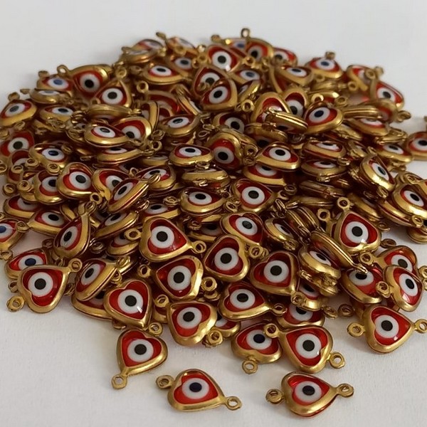 ACESSORIO NO BRUTO PRONTO PARA O BANHO (CX05) - OLHO GREGO DE CORAÇÃO COM DUAS ARGOLINHAS - PESO 0,2GR - (VENDAS POR UNIDADE) BRU000531