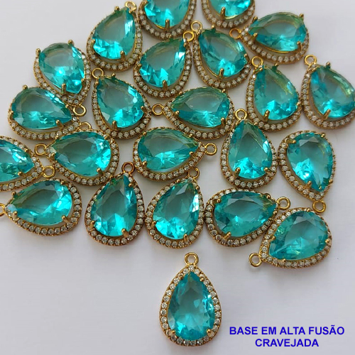 PINGENTE  NO BRUTO PRONTO PARA O BANHO - (PEÇA DELICADA CUIDADO NO BANHO) COM PINGENTE EM ZIRCÔNIA AZUL COM BASE EM ALTA FUSÃO CRAVEJADA - TAMANHO 10X14MM -  PESO TOTAL 2,2GR - BRU9105
