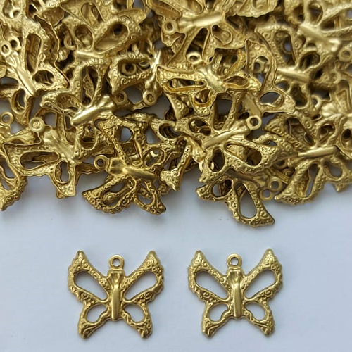 ACESSÓRIO NO BRUTO PRONTO PARA O BANHO - (E1407) PINGENTE BORBOLETA VAZADA 14MM COM UMA ARGOLINHA - PESO 0,4GR - COMPOSIÇÃO: 100% LATÃO (PEÇA VENDIDA POR UNIDADE) - BRU0003095