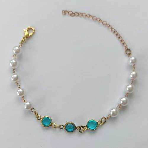 PULSEIRA NO BRUTO PRONTA PARA O BANHO - (CX.03)  PULSEIRA COM PÉROLAS E CRISTAIS AZUIS - TAMANHO 18CM - PESO 2,6GR - FECHO LAGOSTA - BRU15223