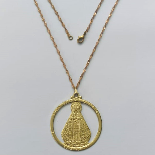 GARGANTILHA NO BRUTO PRONTA PARA O BANHO - (3.1289) GARGANTILHA COM CORRENTE SINGAPURA 60CM E PINGENTE MEDALHA VAZADA NOSSA SRA APARECIDA 39MM - PESO: 4,3GR - COMPOSIÇÃO: 100% LATÃO - BRU15313