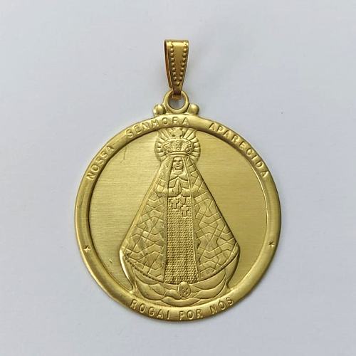 PINGENTE NO BRUTO PRONTO PARA O BANHO - (3.1290) PINGENTE REDONDO NOSSA SRA APARECIDA 38MM - PESO: 5,2GR - COMPOSIÇÃO: 100% LATÃO - BRU15606