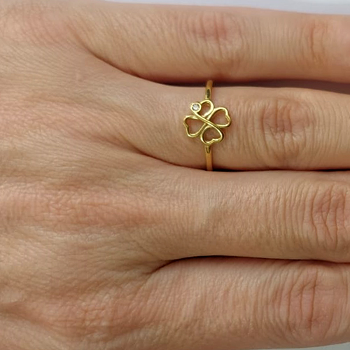 ANEL NO BRUTO PRONTO PARA O BANHO -  (CX.111)  (AX000203W) ANEL TREVO VAZADO COM ZIRCÔNIA - PESO MÉDIO 0,8GR - COMPOSIÇÃO: LATÃO / ZIRCÔNIA - ANEL000497