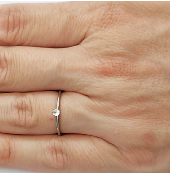 CX/36)ANEL EM AÇO INOXIDAVEL (CAIXA COM NUMERO VARIADOS DO 14 ATE 24) ZIRCONIA CRISTAL AÇO2274