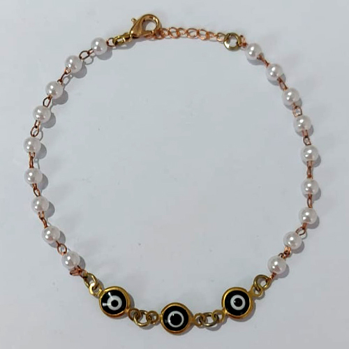 PULSEIRA NO BRUTO PRONTA PARA O BANHO - PULSEIRA EM PÉROLAS E OLHOS GREGOS NEGROS - TAMANHO 18CM + EXTENSOR - PESO 1,7GR- BRU24168