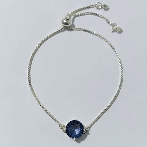 PULSEIRA FOLHEADA A PRATA COM 50 MILÉSIMOS + VERNIZ DIAMOND - PULSEIRA AJUSTÁVEL COM ZIRCÔNIA REDONDA LILÁS 10MM - PRA908