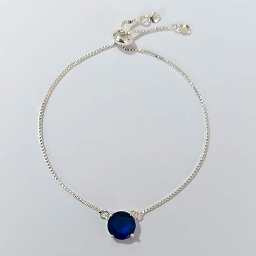 PULSEIRA FOLHEADA A PRATA COM 50 MILÉSIMOS + VERNIZ DIAMOND - PULSEIRA AJUSTÁVEL COM ZIRCÔNIA REDONDA AZUL ESCURA 10MM - PRA913