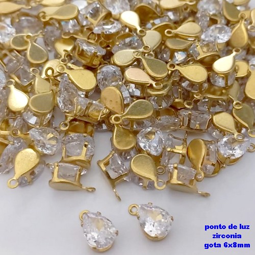 ACESSORIO NO BRUTO PRONTO PARA O BANHO(pote) - PONTO DE LUZ BASE ALTA DE 6x8MM ( ZIRCONIA) COM UMA ARGOLINHA/ VENDIDA POR UNIDADE / PESO 0,05GR / BRU25659