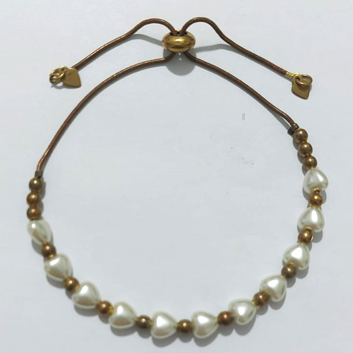 PULSEIRA NO BRUTO PRONTA PARA O BANHO(CX193) - PULSEIRA AJUSTÁVEL COM CORAÇÕES EM PÉROLAS - PESO 5,6GR - COMPOSIÇÃO: 100% LATÃO - BRU27191