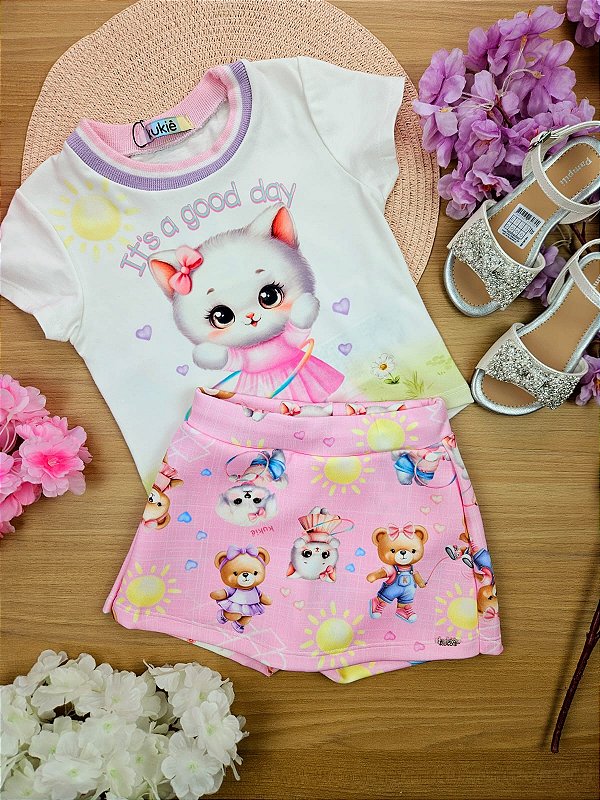 Conjunto de Blusa em Meia Malha e Short Saia em Fly Tech Kukiê