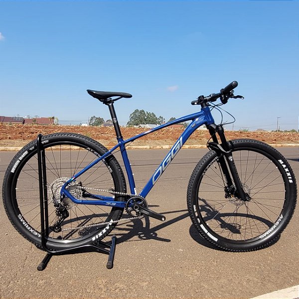 BICICLETA OGGI ARO 29 BW 7.3 DEORE 12V AZ/CINZA TAM L 2026