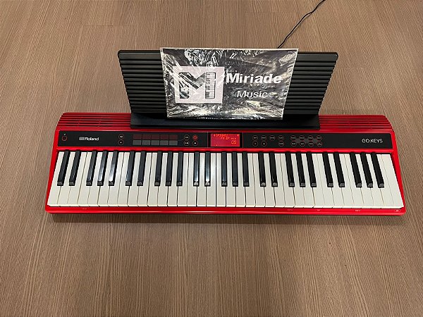 Tecaldo Roland Go Keys + Porta partituras- Produto Usado