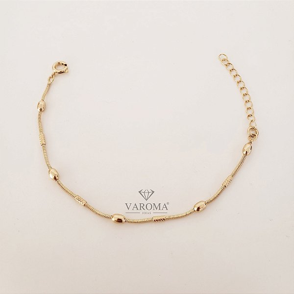 Pulseira infantil com bolinhas lisas banhada em ouro 18k