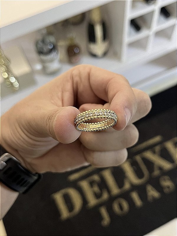 ANEL CRAVEJADO COM PEDRA DE ZIRCÔNIA - BANHADO A OURO 18K