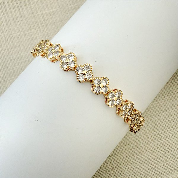 PULSEIRA RIVIERA FLOR DOURADA CRAVEJADA