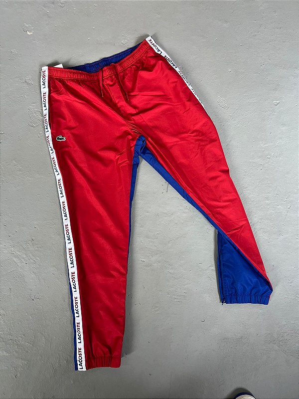 CALÇA LACOSTE SPORT LETREIRO AZUL/VINHO