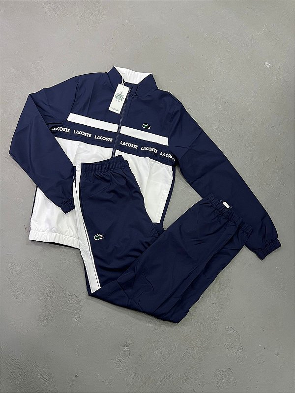 CONJUNTO LACOSTE SPORT CONTRASTE AZUL/BRANCO SEM CAPUZ