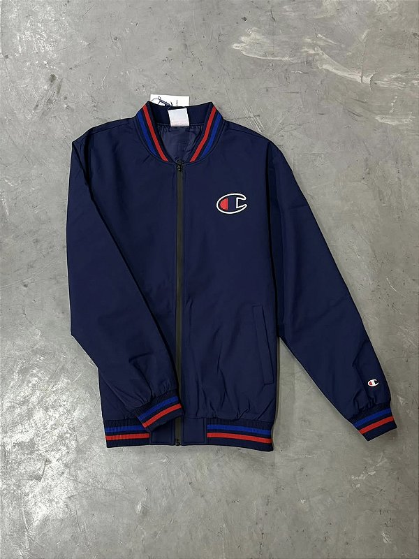JAQUETA CHAMPION ACTIVE BOMBER  LOGO PATCH (AZUL MARINHO)
