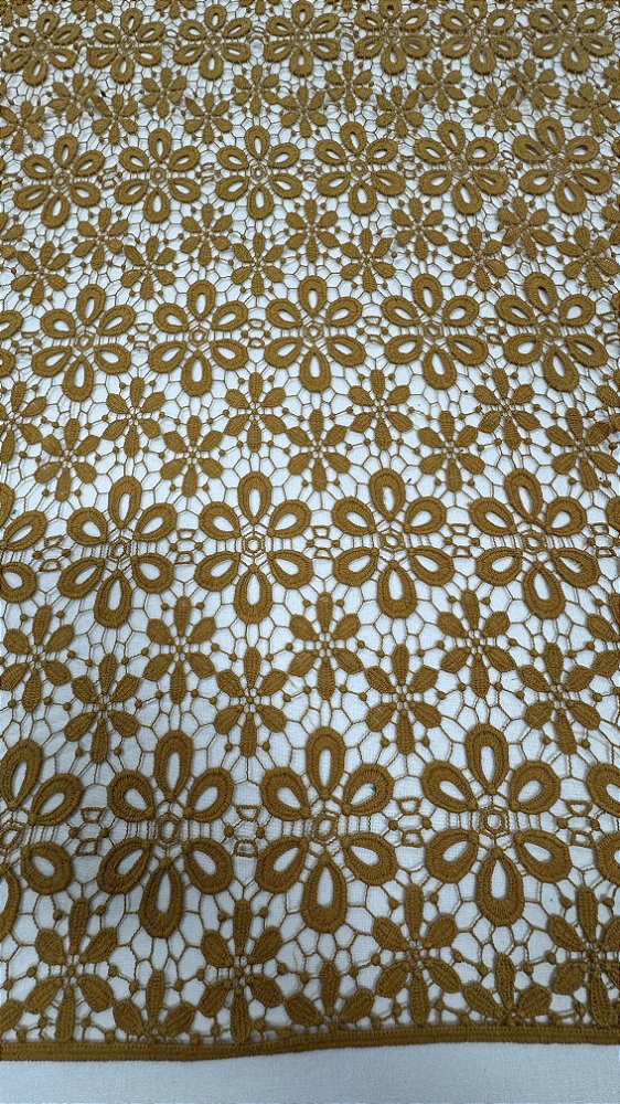 Renda Gupir ouro velho,largura 130 cm composição 100% Poliéster