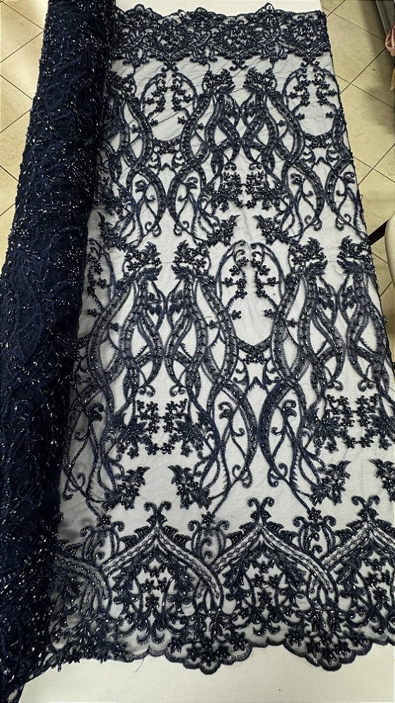 Tule Bordado com pedrarias,azul marinho largura 130 cm composição 100% Poliamida.