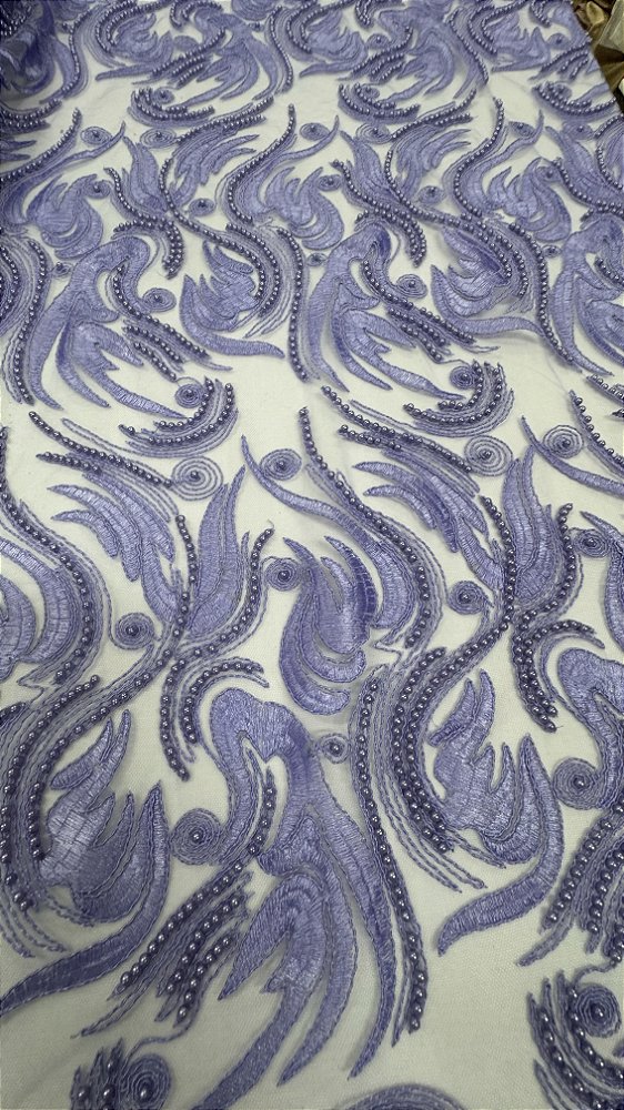 Tule bordado com pérolas,lilás 130 cm composição 100% Poliamida.
