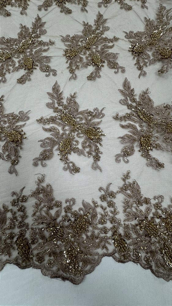 Tule bordado com pedrarias,nude  130 cm composição 100% Poliamida.