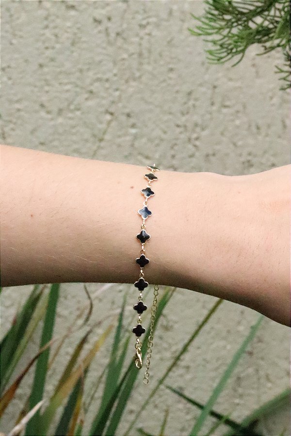 Pulseira trevinho preto • folheado a ouro