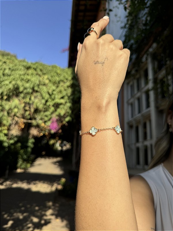 Pulseira trevo azul acqua • folheado a ouro