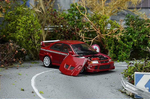 Mitsubishi Lancer Evolution VI GSR T.M.E 1:64 MOTORHELIX Vermelho