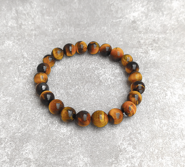 Pulseira Olho de Tigre em esfera 8mm "Autoconfiança e Proteção"