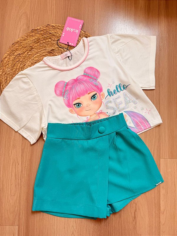 Conjunto de Blusa Boxy Over em Meia Malha e Short Saia Infantil Menina