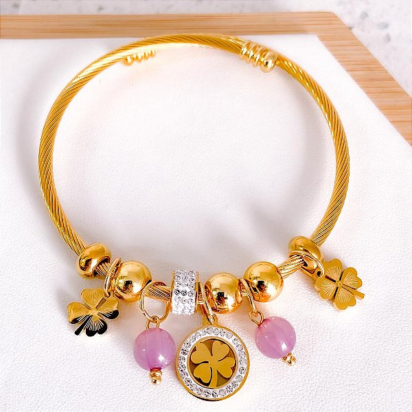 BRACELETE E BERLOQUES  EM AÇO INOX TREVO CRAVEJADO STRASS - DOURADA