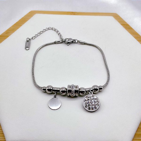 PULSEIRA COM BERLOQUES AÇO INOX  REDONDO CRAVEJADO STRASS - PRATEADA
