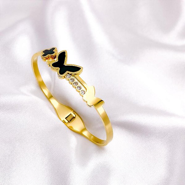 BRACELETE AÇO INOXIDÁVEL BORBOLETA E TREVO PRETO PEDRA CRISTAL- DOURADO