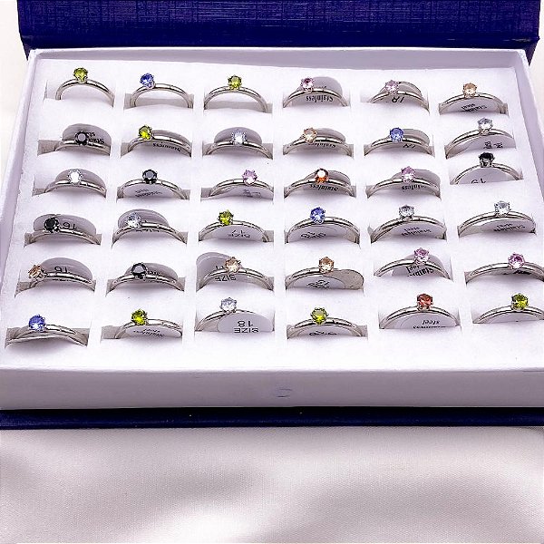 CAIXA ANEL SOLITÁRIO ACO INOXIDAVEL 2MM PEDRAS COLORIDAS - PRATEADO(36 UNIDADES)