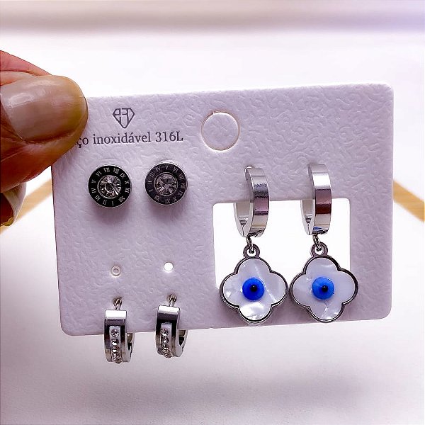 CARTELA BRINCO TRIO AÇO INOX ARGOLINHA CLICK  STRASS  TREVO OLHO GREGO- PRATEADO