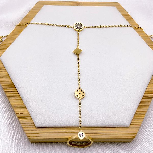 PULSEIRA AÇO INOXIDÁVEL COM ANEL AJUSTÁVEL TREVO PRETO - DOURADA