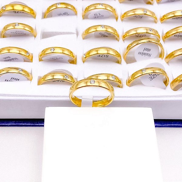 ALIANCA ACO INOXIDAVEL LISA COM PEDRA ZIRCONIA DOURADA 4MM - UNIDADE