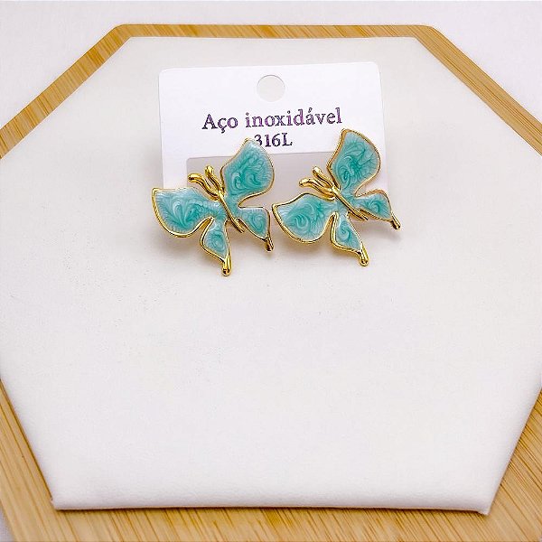 BRINCO AÇO INOX BORBOLETA RESINADO DOURADO - VERDE