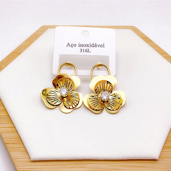 BRINCO AÇO INOX  FLOR COM PEDRA CRISTAL - DOURADO