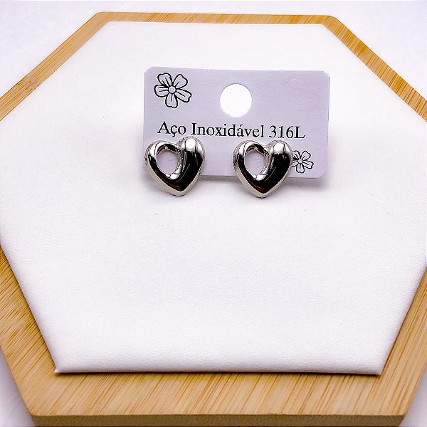 BRINCO AÇO INOX  ESTILO CORAÇÃO VAZADO - PRATEADO