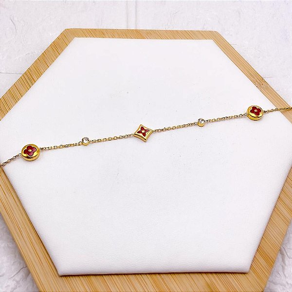 PULSEIRA AÇO INOX TREVO VERMELHO COM PEDRA CRISTAL - DOURADA