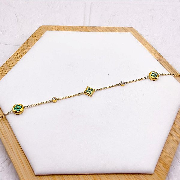 PULSEIRA AÇO INOX TREVO VERDE COM PEDRA CRISTAL - DOURADA