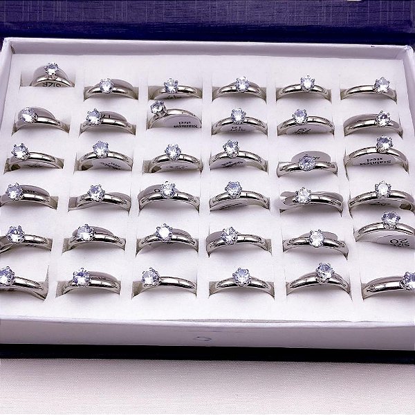 CAIXA ANEL AÇO INOXIDÁVEL SOLITARIO 4MM PEDRA CRISTAL - PRATEADO (36 UNIDADES)