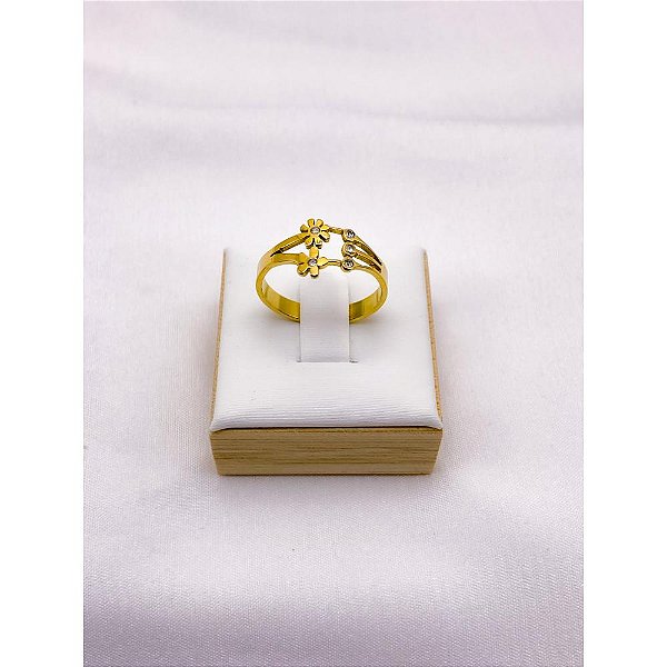 ANEL AÇO INOXIDAVEL FLOR PEDRA CRISTAL - DOURADO (UNIDADE)