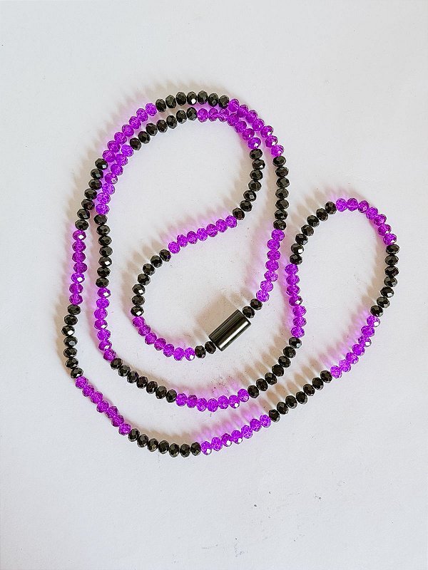 Guia de cristal roxo e preto