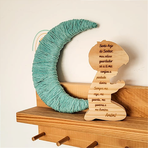 Menino com oração do Santo Anjo