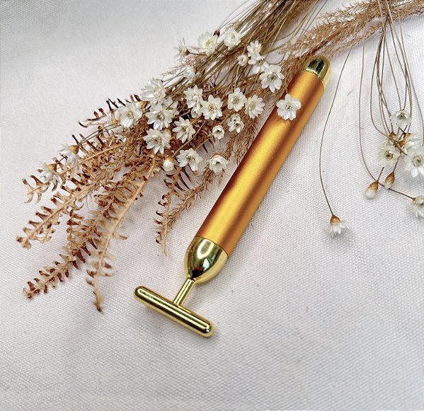 Massageador Facial Dourado Vibratório