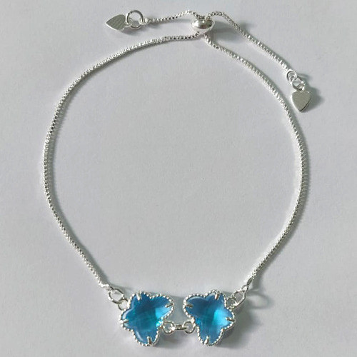 PULSEIRA FOLHEADA A PRATA COM 50 MILÉSIMOS + VERNIZ DIAMOND AJUSTÁVEL BORBOLETAS AZUÍS VIDRO 12MM PRPS000936